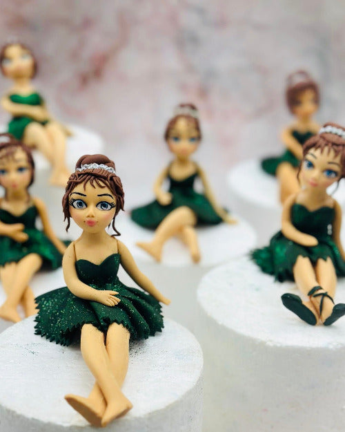 Fondant dancing girl creations from students in a figurine sculpting class